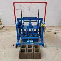 2-45 petite machine manuelle de fabrication de briques en blocs de ciment en béton à vendre en Ouganda