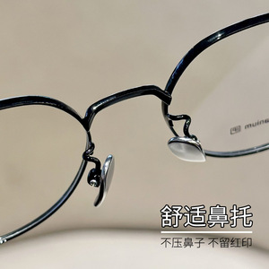 Monturas de gafas ovaladas de estilo coreano Muing 8147, montura completa de titanio puro, gafas graduadas ligeras y cómodas para mujer - Product Image 1