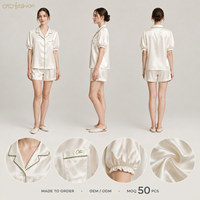 Ensemble de pyjama pour femmes en satin ivoire, manches bouffantes courtes, col cranté, bordure verte, OEM, étiquette privée, vente en gros