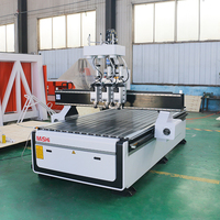 Máquina de grabado CNC de tres cabezales y tres procesos 1325-3 para madera con servomotor NC Studio Syntec