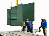 Transformateur de distribution extérieur de type boîtier, rempli d'huile, style américain, monté sur socle vert, 13,8 kV 480Y/277 V 60 Hz