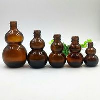 Bouteille en verre ambré en forme de gourde vide 10ml 20ml 30ml avec bouchon à vis pour les soins de la peau Offre Spéciale le récipient d'huile essentielle