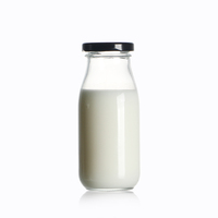 Bouteilles en verre de forme ronde de 250ml vides avec couvercle en métal pour boissons au lait, café, thé et eau
