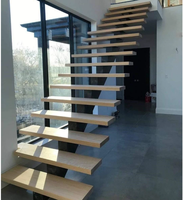 Escalier flottant intérieur personnalisé en teck Escalier intérieur moderne en bois invisible mono limon