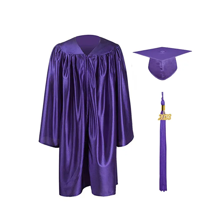 Seragam gaun kelulusan ungu berkilau anak prasekolah dan topi dengan pesona tahun