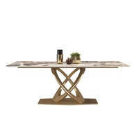 Table à manger moderne en pierre frittée postmoderne de luxe en acier inoxydable grand petit appartement villa modèle chambre salon en métal