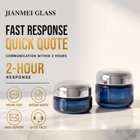 Pot cosmétique vide en verre bleu foncé OEM ODM 50g 30g avec couvercle argenté rechargeable pour crème visage et hydratant