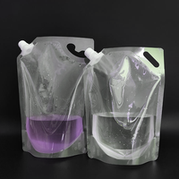 Vente en gros de sachets à bec verseur en PET/PA/PE de qualité alimentaire, biodégradables et recyclables, transparents, de 500 ml à 2 L, pour le lait, avec bec verseur liquide transparent
