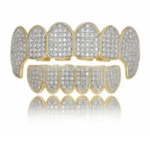 2023 Fashion Body Jewelry Hip Hop Grillz Diamond Teeth alta qualità placcato oro 14K Top e Bottom Fang Grills denti all'ingrosso