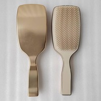 Brosse démêlante professionnelle populaire en chrome doré électroplaqué pour soins capillaires, personnalisable avec logo sur mesure