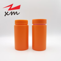 Bouteille pharmaceutique en HDPE opaque orange en gros pour le stockage de capsules, comprimés et pilules destinée aux compléments de santé