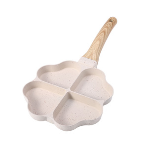 <span class=keywords><strong>Mini</strong></span> <span class=keywords><strong>poêle</strong></span> <span class=keywords><strong>à</strong></span> œufs moderne en métal <span class=keywords><strong>à</strong></span> 4 trous, antiadhésive, avec poignée en bois douce au toucher, durable, portable, compatible <span class=keywords><strong>induction</strong></span> et gaz, fond en fer, 1-2L - Product Image 1