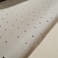 Le papier spécial perforé brun de CAM du fournisseur de la Chine 80gsm recyclable pour l'utilisation de vêtements de sous-couche d'usine de vêtement