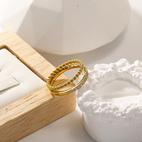 Bague en acier inoxydable torsadée plaquée or avec zircon cubique, double anneau, bijoux de mode pour femmes, vente en gros