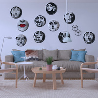 Assiette en céramique pour décoration murale de salon, motif visage humain, idéale pour la maison et comme présentoir à bijoux de bureau, disponible en import.