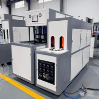 Machine de soufflage de bouteilles en PET semi-automatique à 2 cavités de 5L Machine de fabrication de bouteilles d'huile adaptée aux bouteilles en plastique de 3L 5L 7L 10L