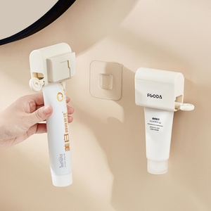 Dispensador automático de pasta de dientes multifuncional de plástico, soporte de pared para cepillos de dientes para el hogar - Product Image 2