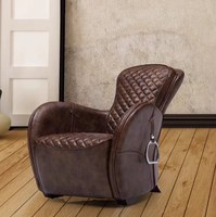 Fauteuil de salon individuel en cuir de vachette style rétro industriel, type selle de cheval, en chêne, pour une relaxation optimale
