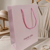 Sacs en papier blanc en gros avec logo personnalisé, sacs en papier d'emballage pour boutique de vêtements