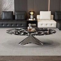 Table basse ovale moderne en marbre, petite et simple, idéale pour salon design familial