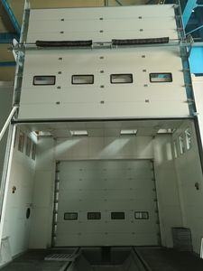 <span class=keywords><strong>Porte</strong></span> <span class=keywords><strong>sectionnelle</strong></span> coulissante industrielle robuste pour hangars d'avions et grandes installations commerciales - Product Image 2