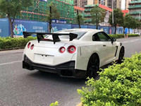 Nouveau pour GT-R (R35) Kit carrosserie amélioré style NISMO Pare-chocs Jupes latérales Passage de roue Capot Spoiler Diffuseur Fibre de carbone