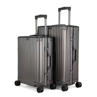 Bagages de voyage personnalisés en alliage d'aluminium moderne et durable Valise de marque OEM/OEM avec roues pivotantes pour le marché mondial