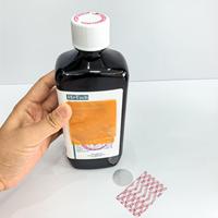 Bouteille cylindrique en verre de 120 ml et 300 ml avec logo personnalisé et impression sérigraphique pour la marque NEOS