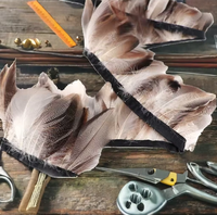Vente en gros de plumes d'oie de canard de couleur naturelle de 8 à 10cm garnitures de franges à motif brut pour l'artisanat, la maison, la fête et le mariage