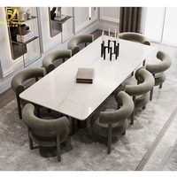 Ensemble table à manger moderne de luxe 4-8 places en marbre blanc 6 chaises pour la maison Villa design stable en métal pour les meubles de salle à manger