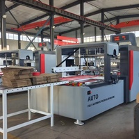 Machine automatique de pliage et de collage de cartons ondulés avec fonction de regroupement