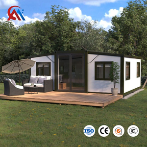 Maison conteneur méditerranéenne moderne compacte et extensible de 20 pieds avec <span class=keywords><strong>chambre</strong></span> et salon pour petite famille, idéale comme <span class=keywords><strong>chambre</strong></span> <span class=keywords><strong>d</strong></span>'amis dans un jardin. - Product Image 2