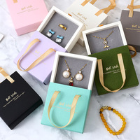 Boîte cadeau d'emballage de bijoux en papier kraft coulissant à tiroir pliable de luxe personnalisé estampage à chaud imprimé avec poignée de ruban pour bougies