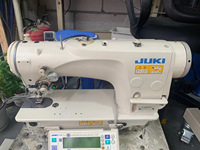 Machine à coudre surjeteuse industrielle d'occasion Jukis 2290-7 pour vêtements