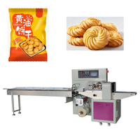 Machine d'emballage automatique avec fonction de découpe précise, idéale pour les biscuits au beurre, les cookies, les nouilles – Machine d'emballage horizontale à flux continu.