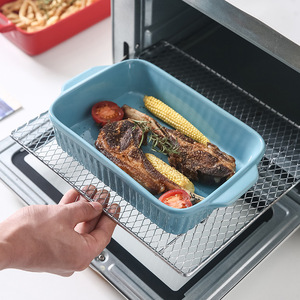 Ceramic baking pan with handles, rectangular shape, for baking cheese rice, microwave-safe, air fryer, and oven use. - Product Image 1