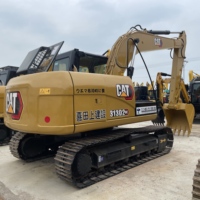CAT 313D2GC d'occasion stable pour la construction ferroviaire et la manutention de lestage, destiné aux projets de fondation de voies et de construction de gares