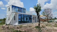 Maison conteneur préfabriquée détachable à 4 modules à faible coût avec design moderne et fonctionnalité respirante – Atelier/Appartement