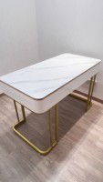 Chaise de bureau moderne et simple en marbre, style luxe léger, avec structure métallique, idéale pour salons de beauté et cabinets médicaux