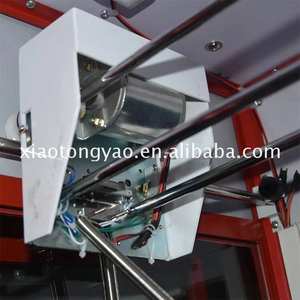 Máquina expendedora de juegos de grúa de garra con tijeras, muy vendida en China - Product Image 2