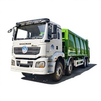 Camion compacteur de déchets diesel manuel Shacman H3000 8x4 pour la collecte des déchets urbains