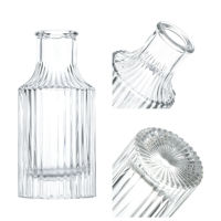 Vente en gros de flacons diffuseurs en verre côtelé de 150 ml, vides, pour huiles aromatiques et parfums d'ambiance, avec logo personnalisé