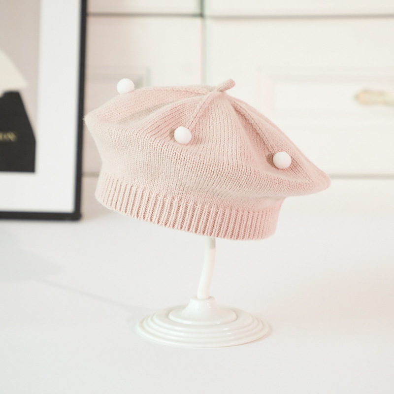 Béret rose en fil boule ronde