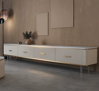 Table basse et meuble TV modernes de luxe avec plateau en marbre et rangement en acier inoxydable pour salon et chambre
