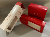 Boîte d'emballage alimentaire jetable haut de gamme avec gaufrage, pelliculage brillant/mat, et pochettes personnalisées pour gâteaux, chips et plus