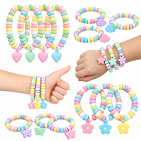 Vente en gros OEM de bonbons personnalisés multicolores en forme de collier et de bracelet, bonbons durs compressés saveur fruitée, étiquette personnalisée, en vrac pour fêtes