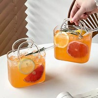 Mug en verre borosilicate soufflé à la main Fumashi, style INS moderne, résistant à la chaleur, en forme de sac à main, capacité 770 ml, pour cocktails et thés aux fruits