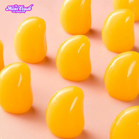 Bonbons pelés Bonbons gommeux Saveurs mélangées Saveur de mangue et collations sucrées en forme de mangue