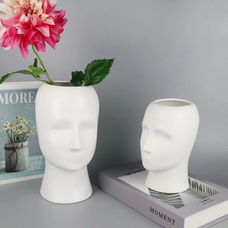 Unique design home decoration ceramic face vase