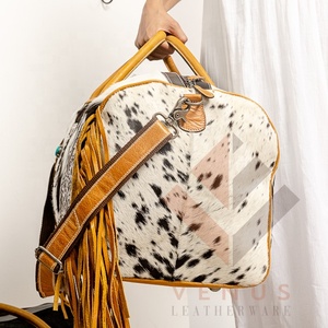 กระเป๋าสะพายไหล่สำหรับผู้หญิงแบบตะวันตกสไตล์คาวเกิร์ลพิมพ์ลายวัวสีดำและสีขาวพกพาได้ป้องกันการขโมยสำหรับฤดูใบไม้ผลิ - Product Image 3